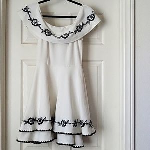 White dress with black flowers